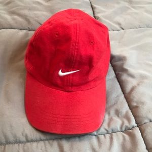 Red child’s Nike hat